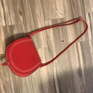 Red leather bag , only been used once .